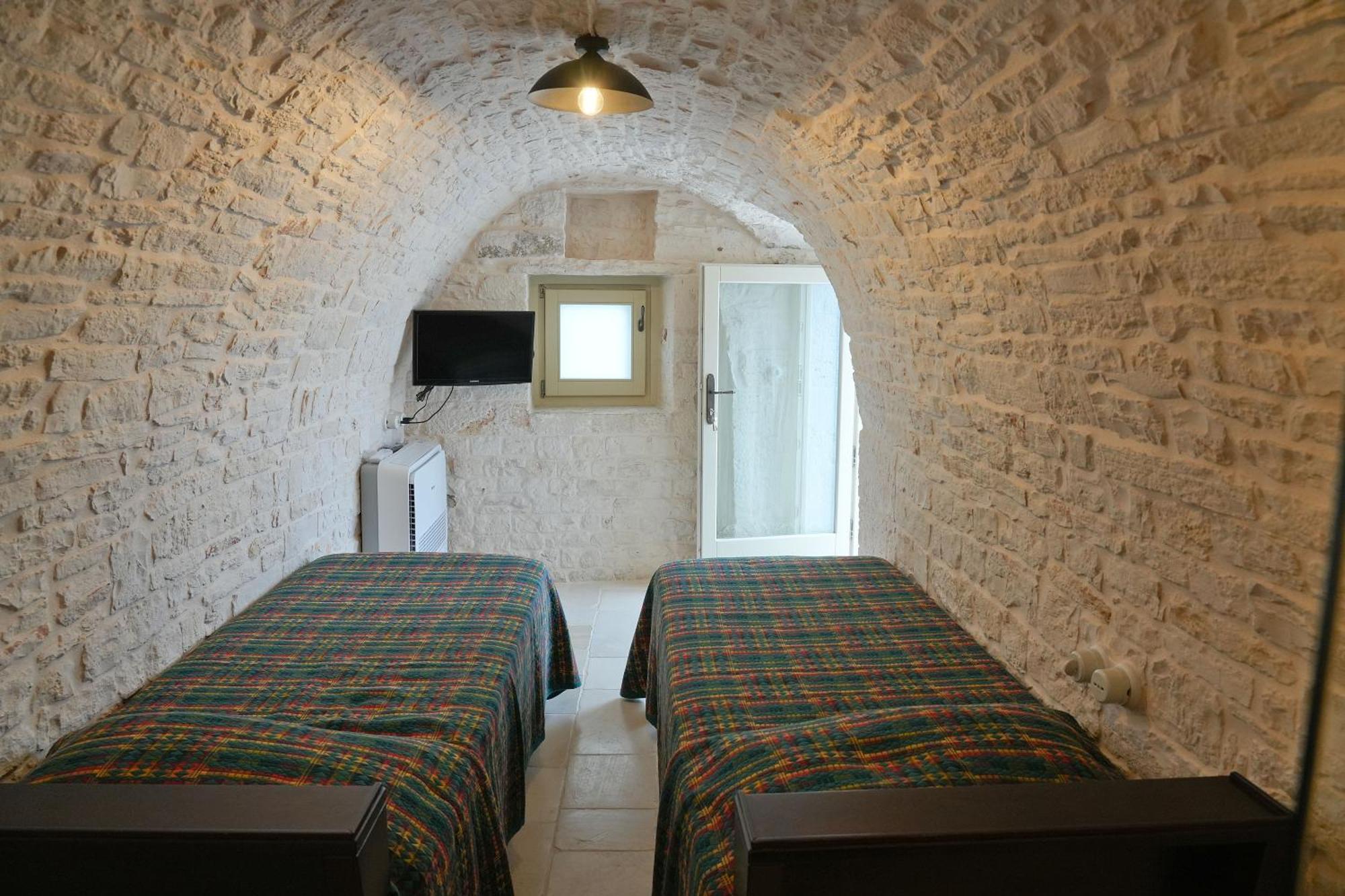 Вилла Trulli Occhi Di Pietra Historical Experience Альберобелло Экстерьер фото